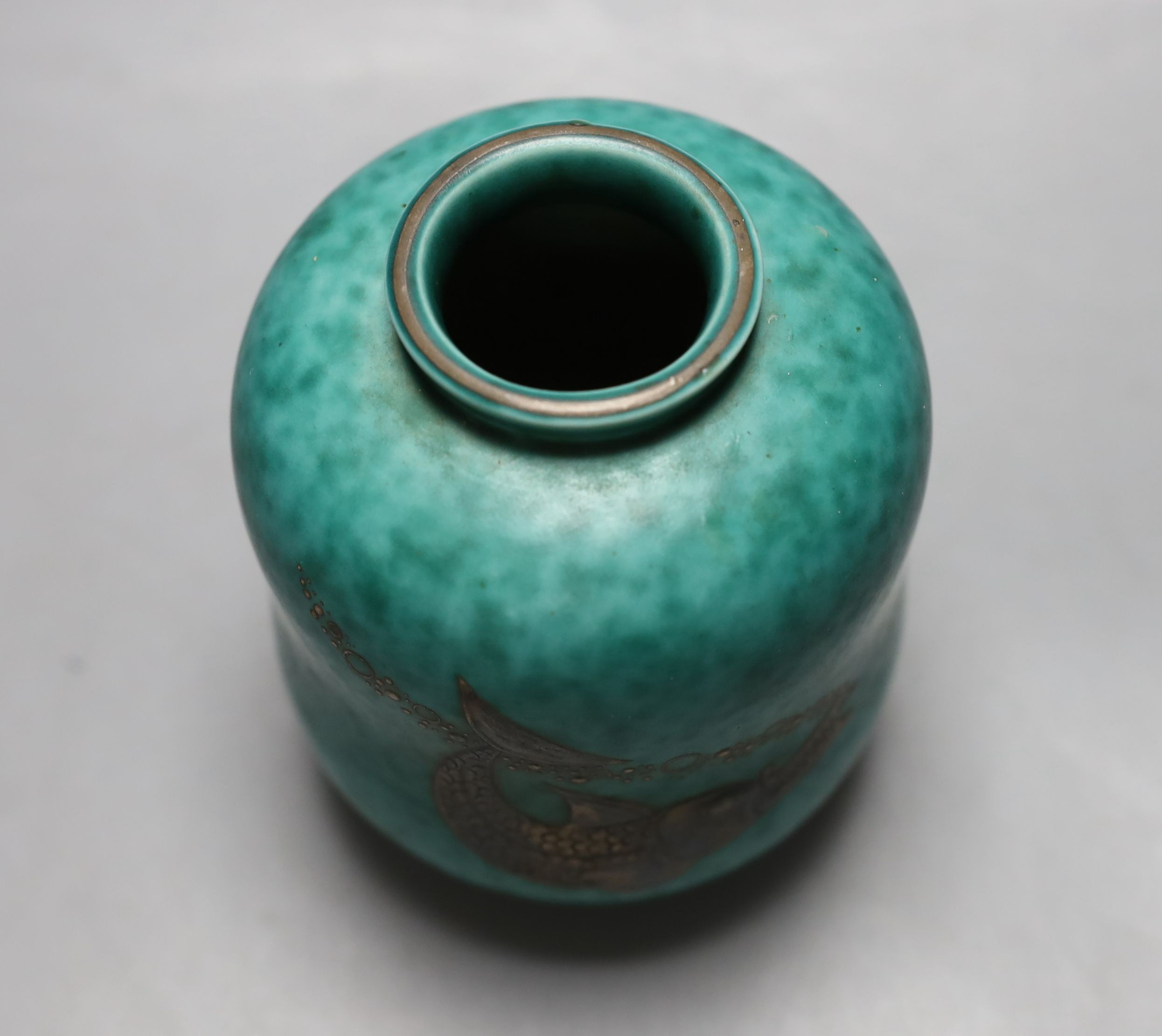 Willhelm Kage for Gustavsberg, a Swedish green glaze ‘Argenta’ ware vase, numbered 1079.1, 12cm tall